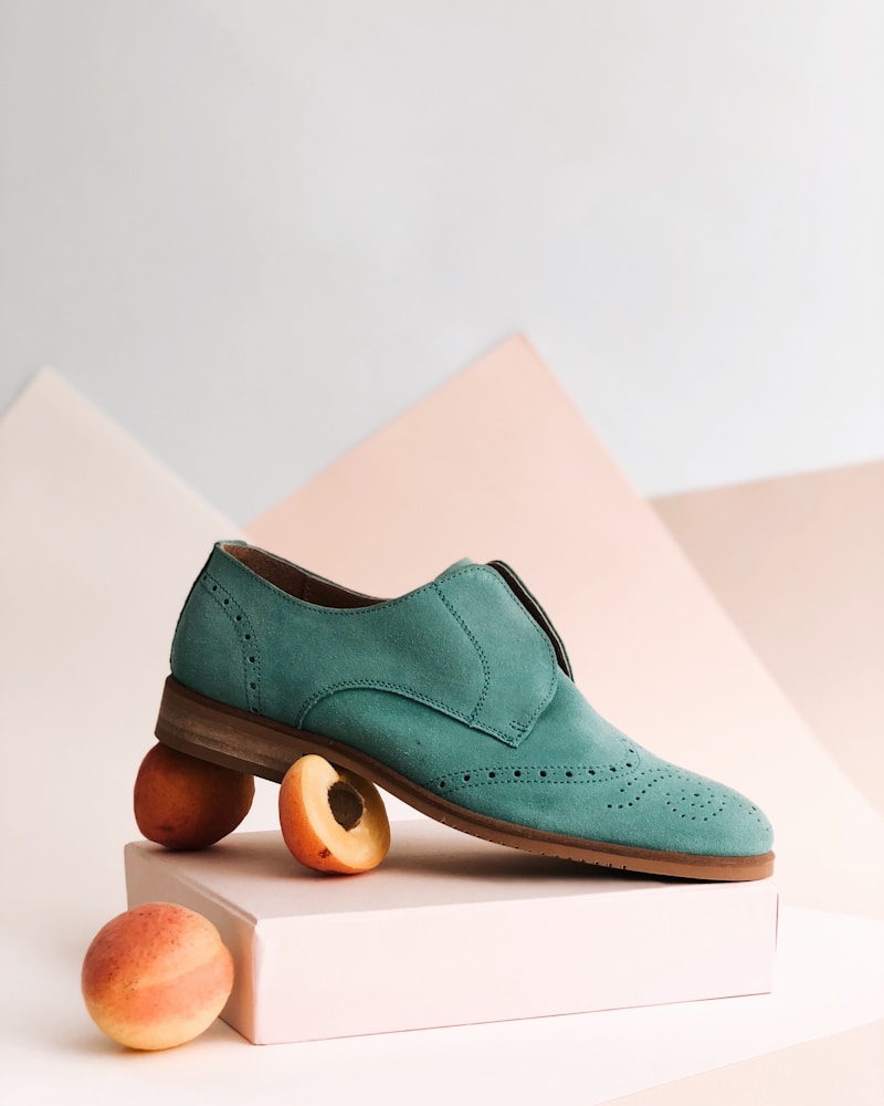 Green Suede Shoe on Peach